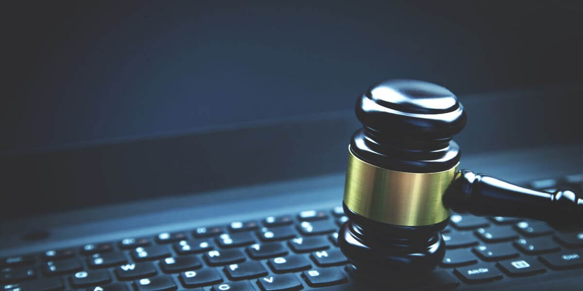 gavel hitting laptop