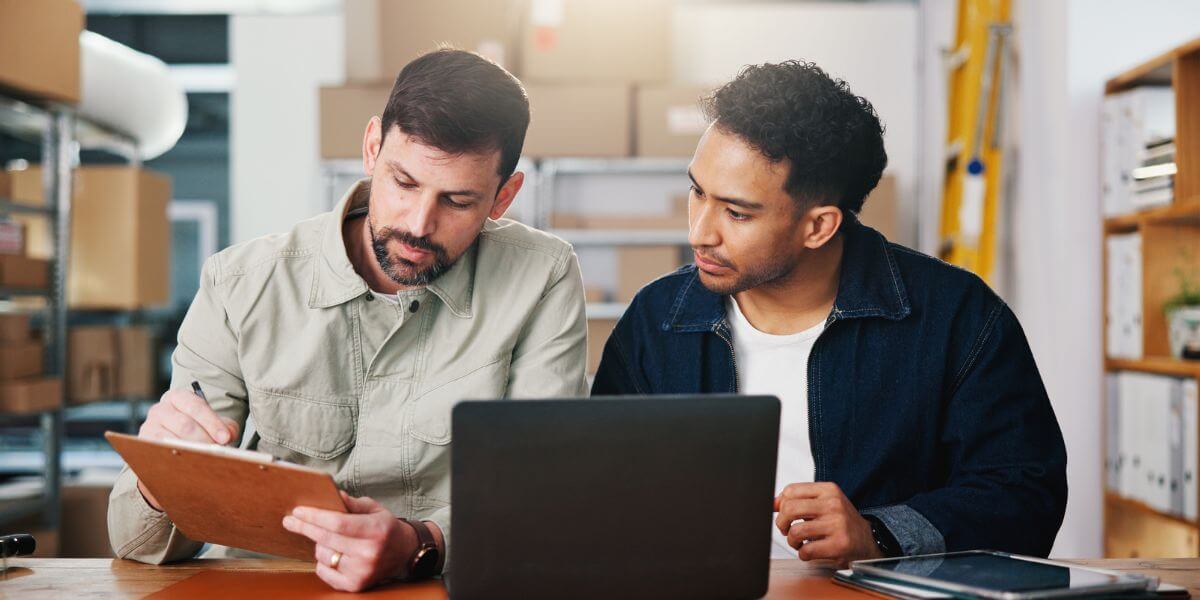 two men at desk