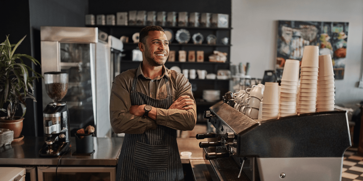 man working in a coffee shop