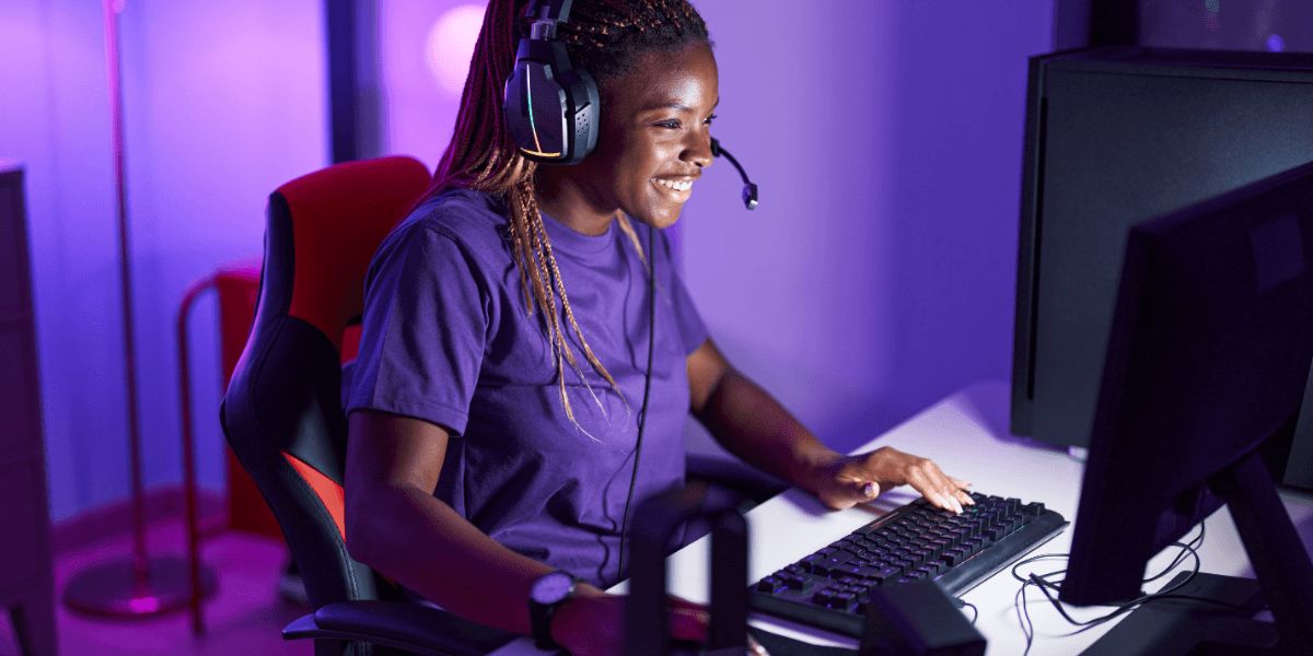 girl gaming on a PC