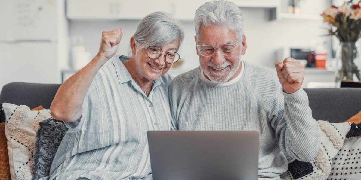 couple using laptop