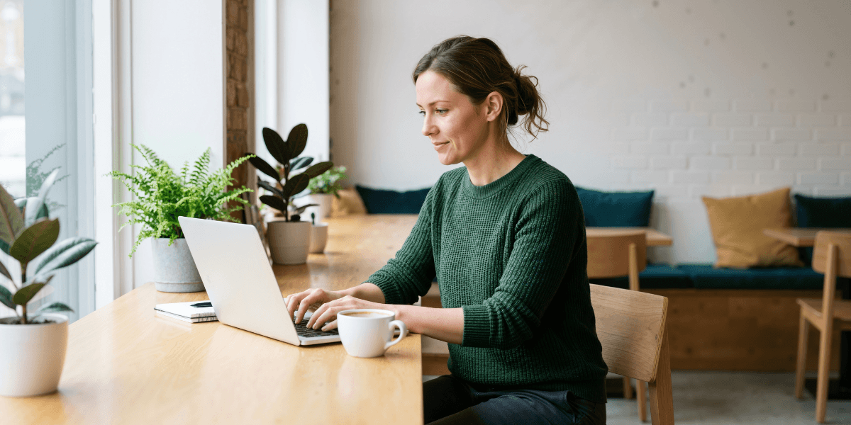 person on her laptop