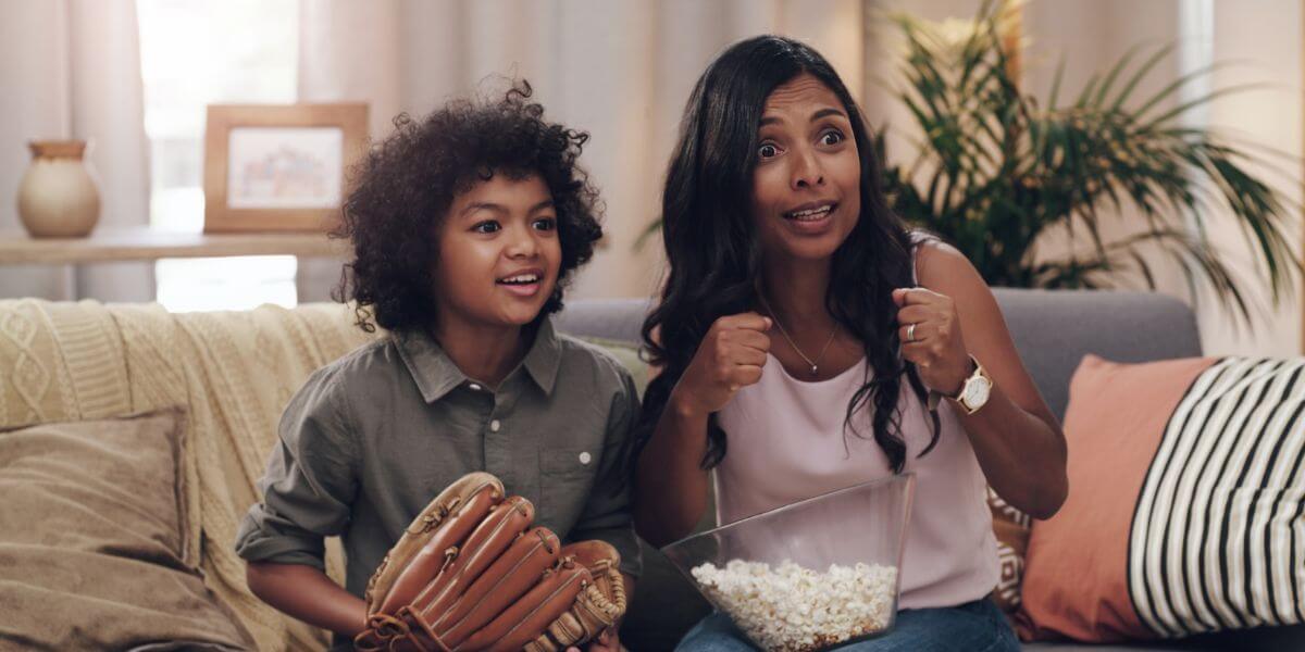 woman and kid watching tv