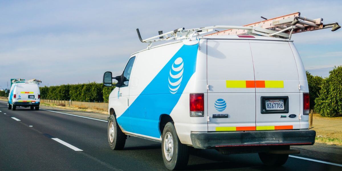 AT&T vans on road